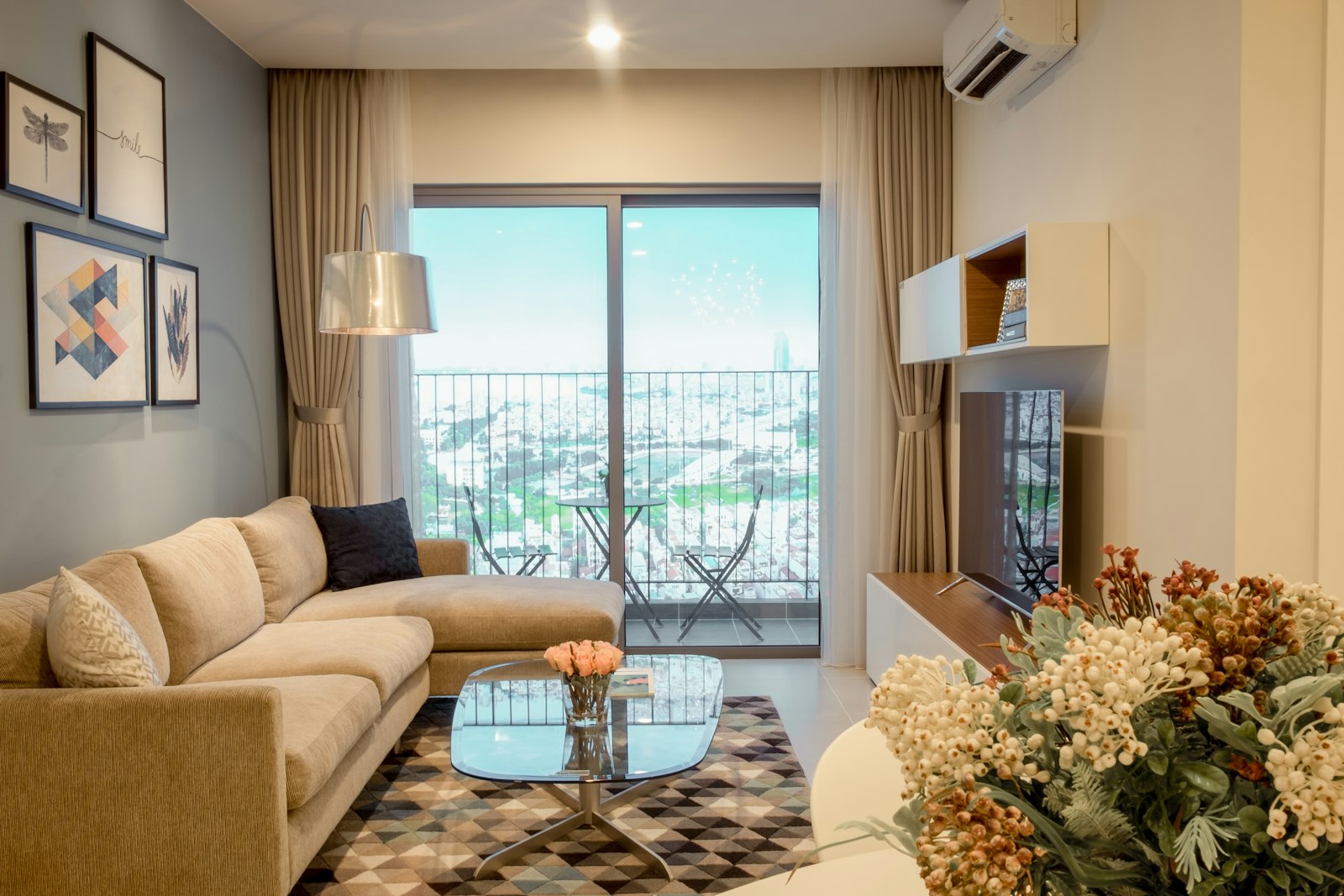 Furnished two-bedroom apartment living area, representative example